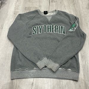 Syltherin sweater from Harry Potter store